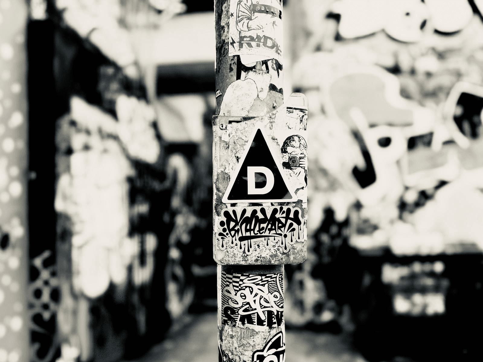 Lamp post with The Decried logo sticker